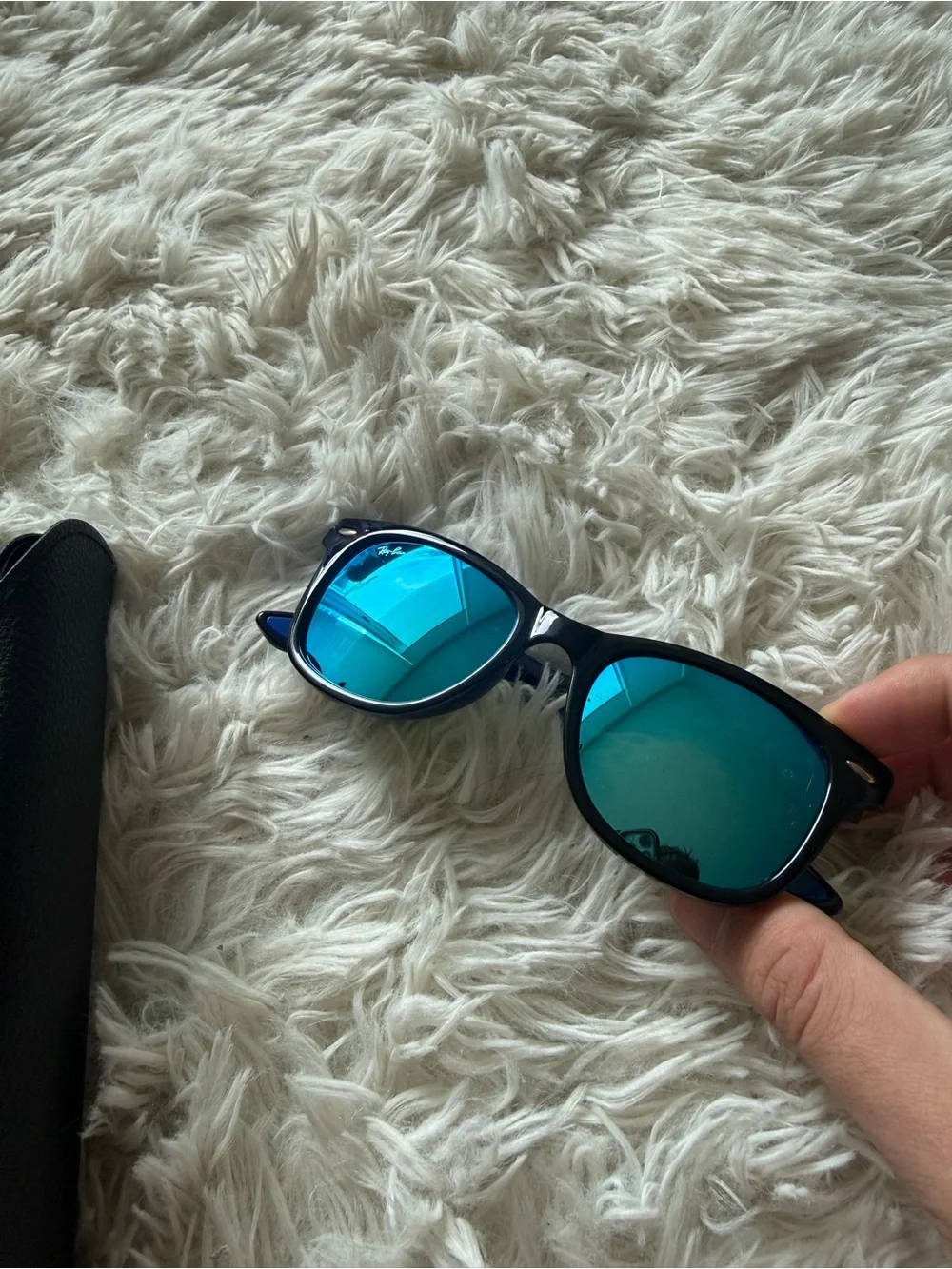 Ray-Ban Black Frame Sunglasses with Blue Mirrored Lenses